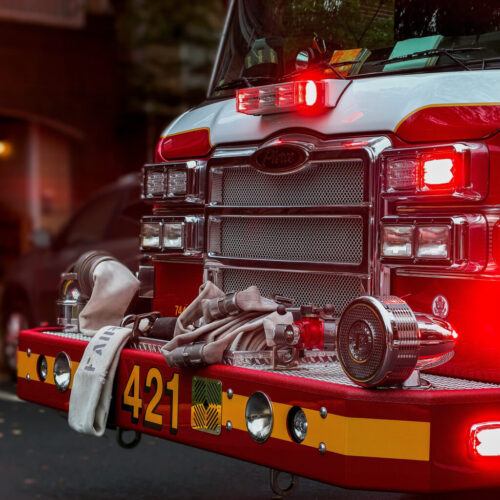 A close-up image of a red fire truck